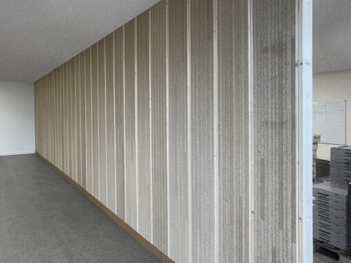 Cloison LongBoard : Transformer un déchet en composant du bâtiment.